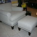 Custom built chair and ottoman with nail trim, featured in Traditional Home and Seattle Home and Garden.