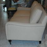 Custom built english arm sofa with custom cup casters.