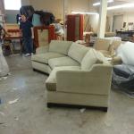 Custom remodeled and upholstered sectional, was three pc sectional made into single sofa added custom walnut base.