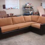 Custom build sectional upholstered in leather and mohair for residential use.